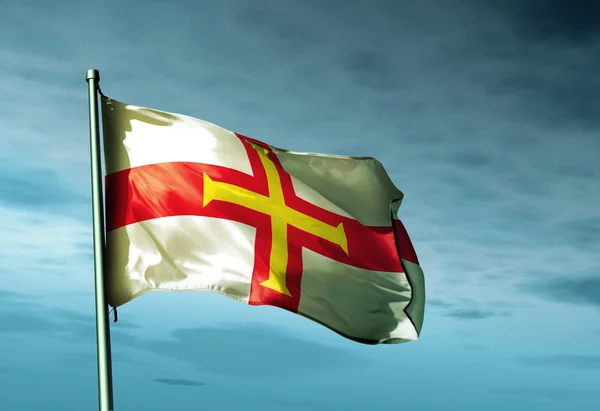 Guernsey flag waving on the wind — Stock Photo, Image
