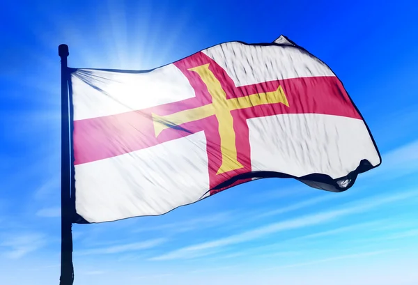 Guernsey flag waving on the wind — Stock Photo, Image