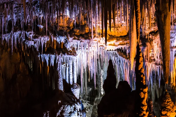 Stalactites, stalagmites and other formations in a cave