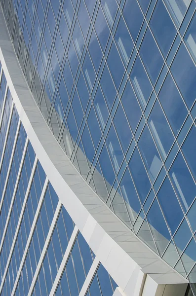 Detail of the facade of a modern office building of glass and st Stock Image