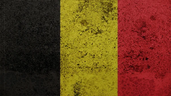 Belgium zászlója a régi falon textúra — Stock Fotó