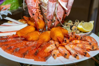 Cold seafood appetizer. Sea delicacies are ready to eat. Close up