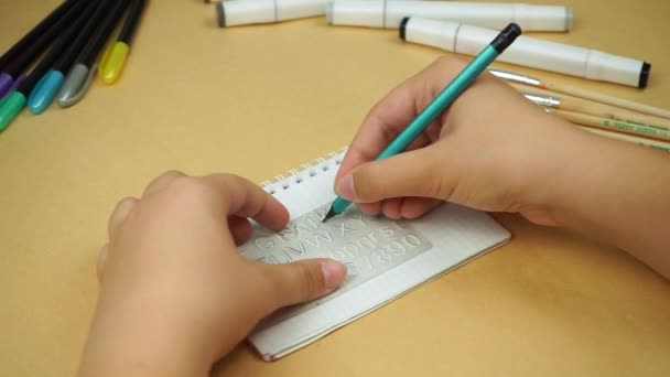 Girl Writes Pencil Stencil Back School View — Stockvideo