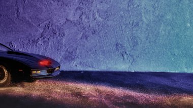 Madrid, İspanya; 01-23-2022: Şövalye Binicisi TV dizisinin ünlü Kitt arabasının önünde arkasında beton bir duvar olan model