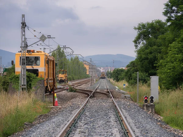 Railway Machines Rails Parked Service Tracks Waiting Work Next Illuminated — Stockfoto