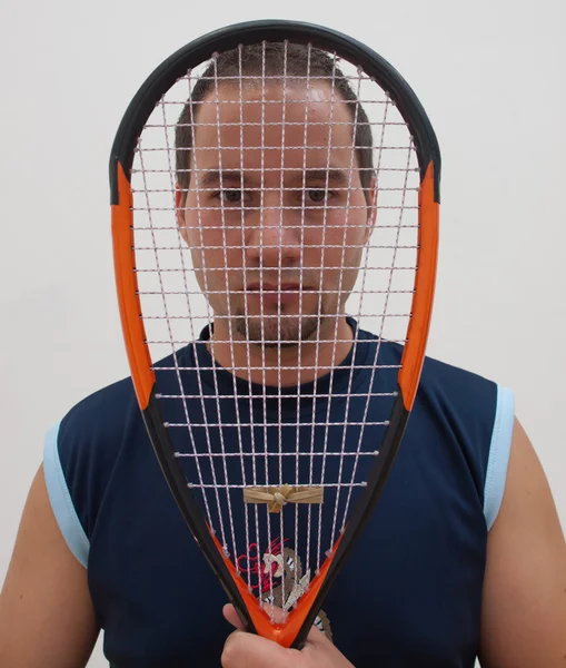 Squash speler met racke Stockafbeelding