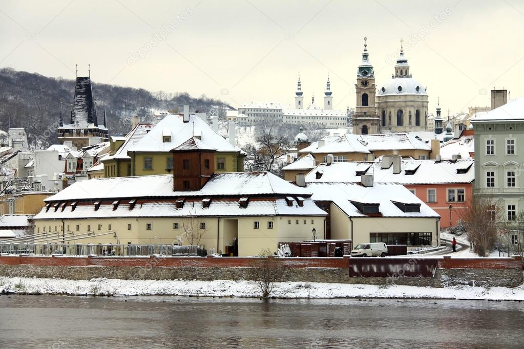Romantic snowy Prague St. Nicholas' Cathedral, Czech republic