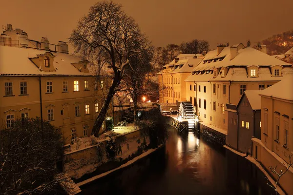 Night romantic snowy Prague Mill above Certovka, Czech republic — Stock Photo, Image