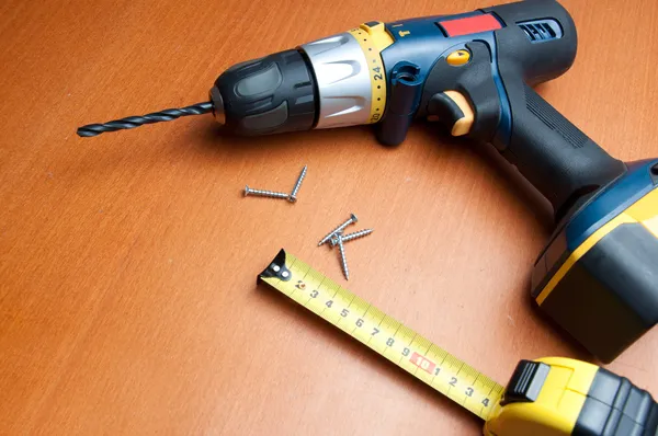 Tools on wooden panel — Stock Photo, Image