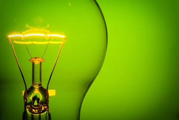 Glowing light bulb — Stock Photo, Image