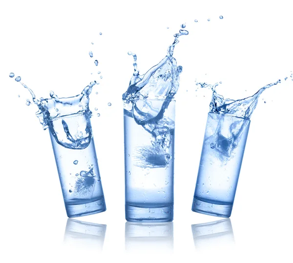 Water splash in glasses isolated on white — Stock Photo © artjazz 3506896