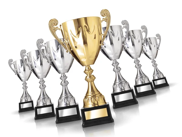 Golden trophy among many silver trophies — Stock Photo, Image