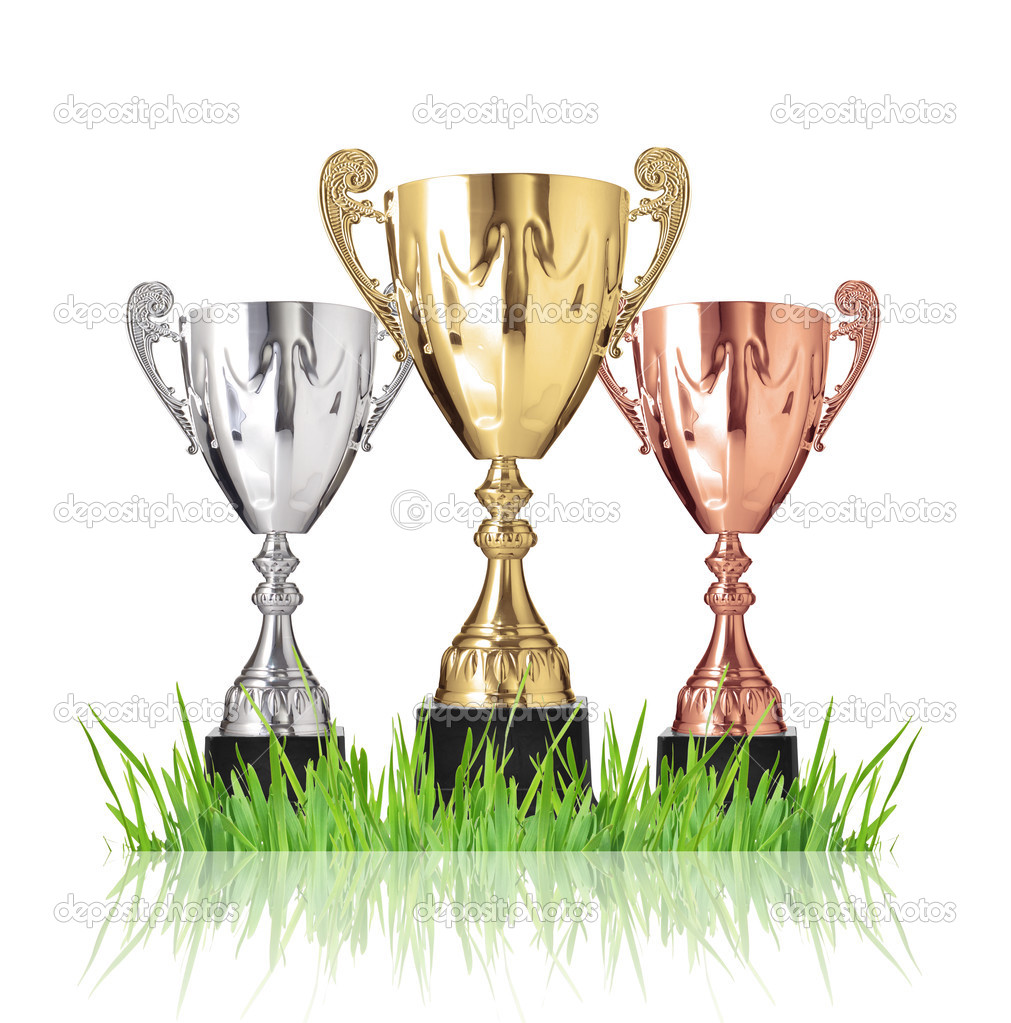 Trophies on green grass