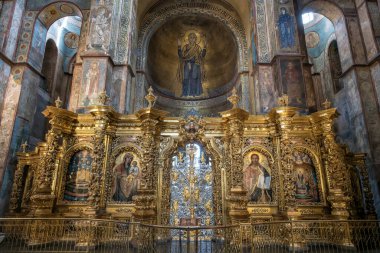 Interior of the St. Sophia Cathedral with mosaic Orans of Kyiv, frescoes on the wall and the golden altar. Kyiv, Ukraine, July 2022. High quality photo