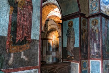 Interior of the St. Sophia Cathedral with mosaic, painting frescoes on the wall and the golden altar. Kyiv, Ukraine, July 2022. High quality photo
