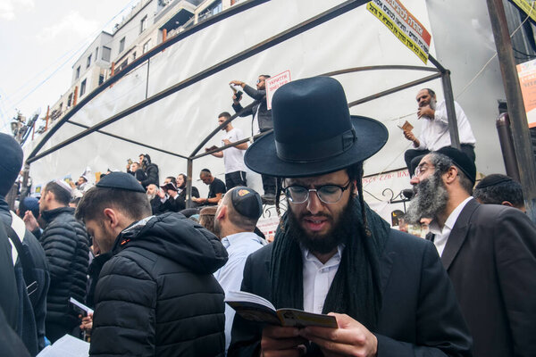 Ultra-Orthodox Jewish pilgrims pray at the tomb of Rabbi Nachman of Breslov during the celebration of Rosh Hashanah holiday, the Jewish New Year, in Uman, Ukraine September 25, 2022