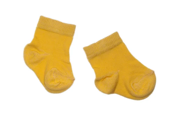 Calcetines de bebé amarillos Fotos De Stock