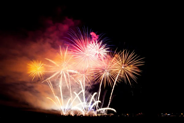 Colorful fireworks over night sky — Zdjęcie stockowe