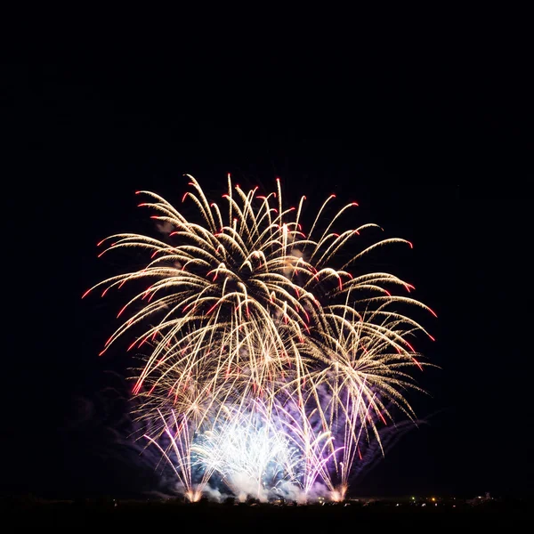 Colorful fireworks over night sky — Stock Photo, Image