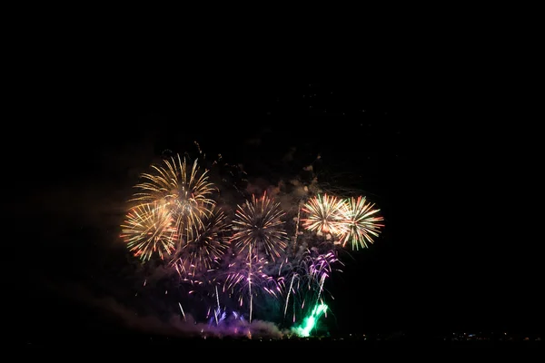 Colorful fireworks over night sky — Stock Photo, Image