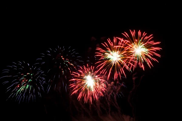 Colorful fireworks over night sky — Stock Photo, Image