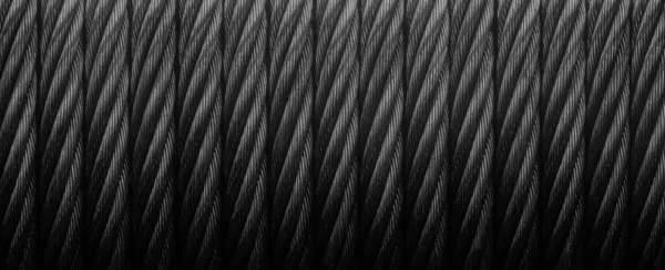 Metal cable winch. Black Steel rope winch close-up. Strong still background — Foto Stock