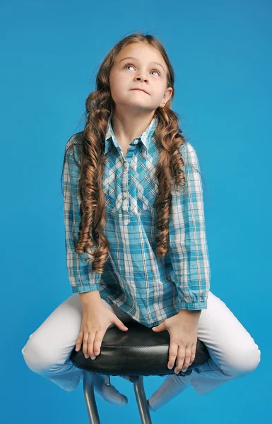 White caucasian girl on a bar stool — Stock Photo, Image