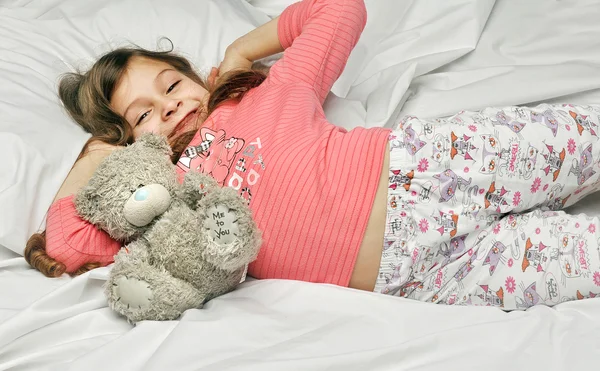 Little girl stretch oneself — Stock Photo, Image