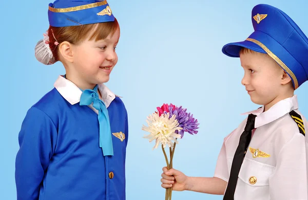 Little pilot and stewardess — Stock Photo, Image