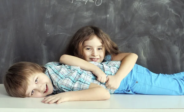 Young children playing in the school pupils — Stock Photo, Image
