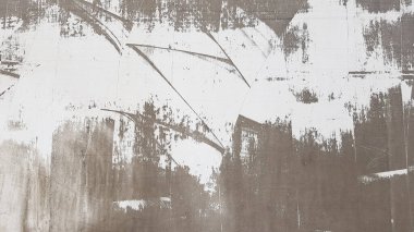 Yıpranmış ve eskimiş beton duvarlar, çoğunlukla siyah ve beyazdan soyulmuş ve ağlanmış. Gri ve beyazın tonları. Harika modern, dokulu arka plan. Soyut eski arkaplan.