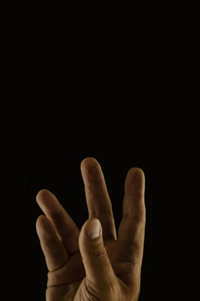 Persoon Hand Zwarte Achtergrond — Stockfoto
