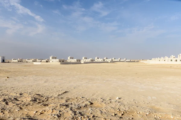 Nieuwe huizen in woestijn (oman) Stockafbeelding
