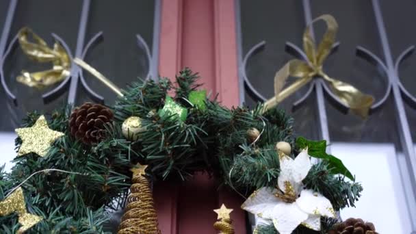 Low Angle View Elegant Christmas Wreath White Flowers Golden Ribbon — Stock Video