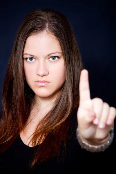 Schöne Frau zeigt Zeichen — Stockfoto