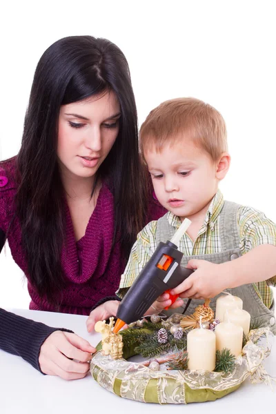 Woman and boy with advent wreath — Stock Photo, Image