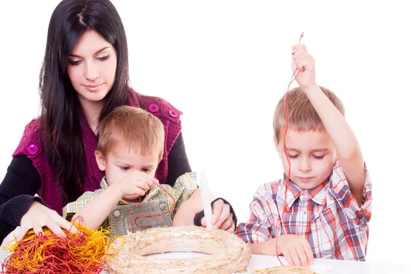 Woman and boys with advent wreath — Stock Photo, Image