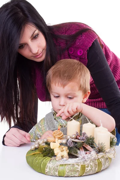 Woman and boy with advent wreath — Stock Photo, Image