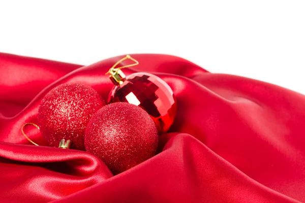 Christmas balls on silk — Stock Photo, Image