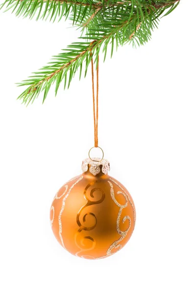 Christmas ball on green spruce branch - isolated — Stock Photo, Image