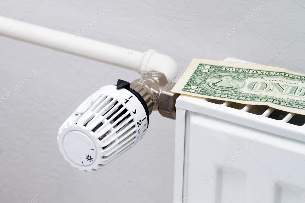 Heating thermostat with money (one dollar)