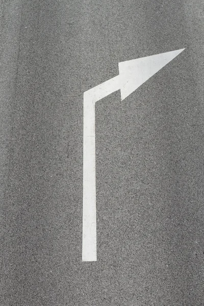 Arrows on asphalt showing traffic where to go — Stock Photo, Image