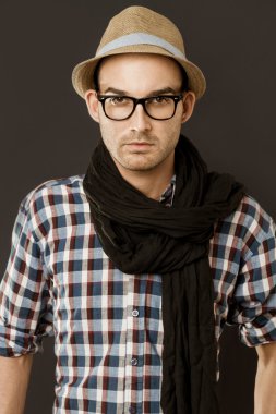 fashion man wearing scarf and hat