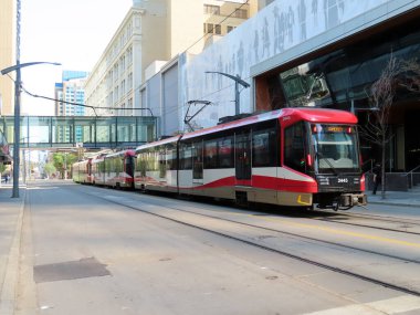 Calgary, Alberta, Canada. Sep 5, 2022. Close up to a Public rapid transit system, light metro rail vehicle in Downtown Calgary with Directions to Somerset (C-Train) public transportation.