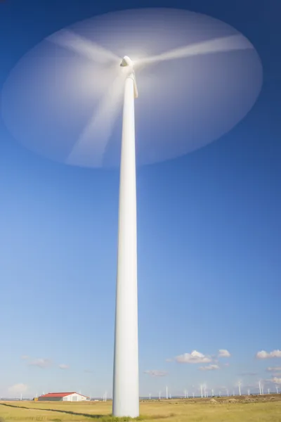 Wind turbine in motion. Royalty Free Stock Photos