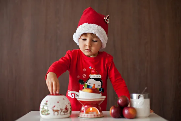 Boy, preparing apple jam