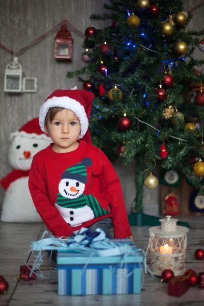 Boy, opening present on christmas — Stock Photo, Image