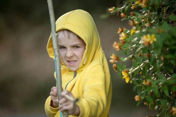 Preschool Boy Shooting Bow Arrow Sunset Garden — Stock Photo, Image