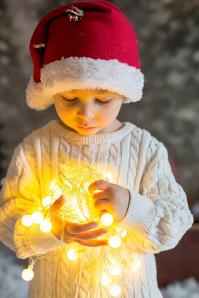 Beautiful Toddler Boy Holding Christmas Light String Looking Camera Close — Stock Photo, Image