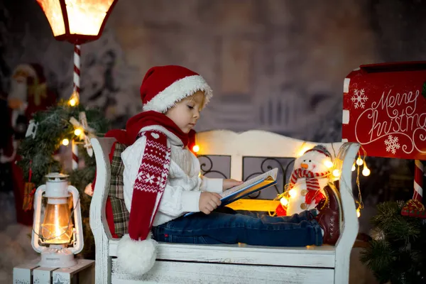 Beautiful Child Blond Toddler Boy Reading Book Sitting Bench Christmas — Stock Photo, Image